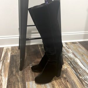 Black above the knee boots